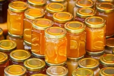 Multiple jars with different types of honey