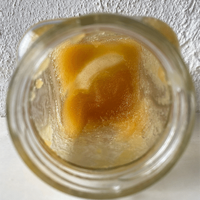 Inside view of a jar of raw crystallized honey