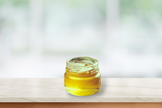clover honey sitting on a kitchen counter